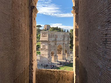 Constantine's Arch through window of the Colosseum