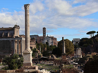 Single pillar in front of ruins in Roman Forum