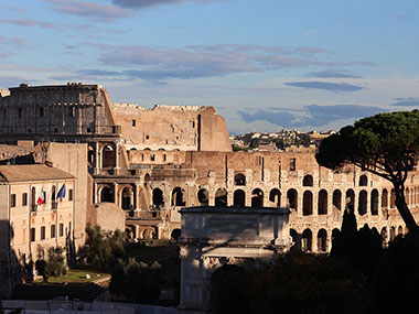 Colosseum in distance beyond Roman Forum