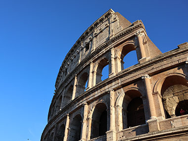 Blue sky beyon the Colosseum