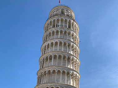 Leaning Tower of Pisa with blue sky beyond it