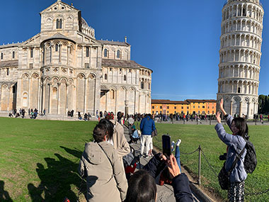 People taking pictures of Leaning Tower of Pisa