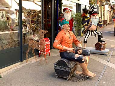 Statues in front of store