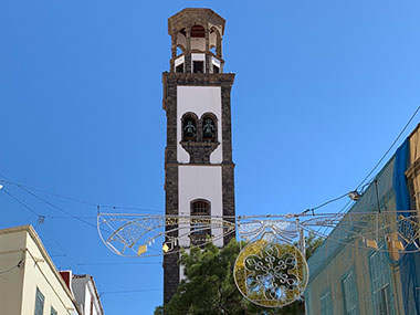Bell tower with christmas ornamentation in front - Tenerife