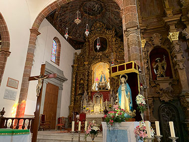 Cross in front of altar