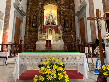 Flowers in front of altar