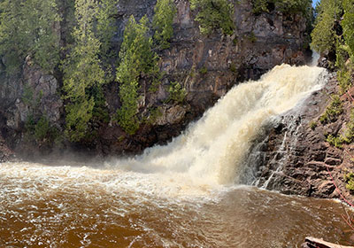 Caribou Falls flows into river
