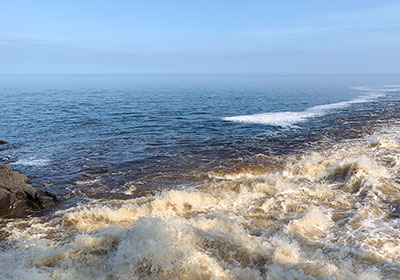 Cascade River water meets lake water in Lake Superior