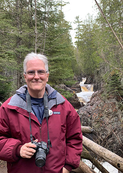 Pat in front of waterfall