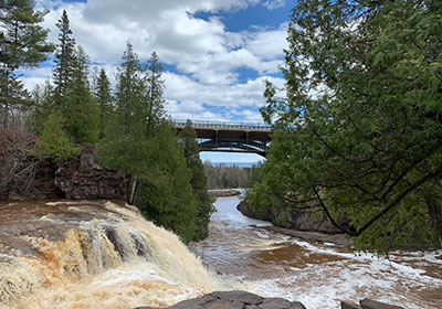 Bridge in distant passes over a river