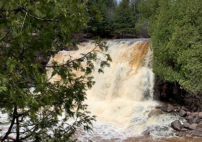 waterfall with foam in front of it