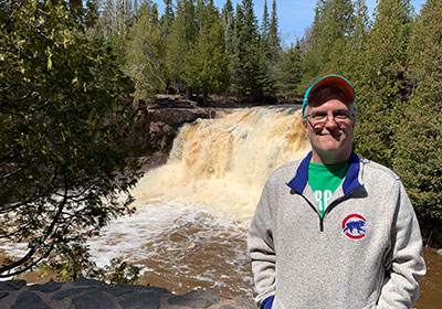 Pat in front of waterfall