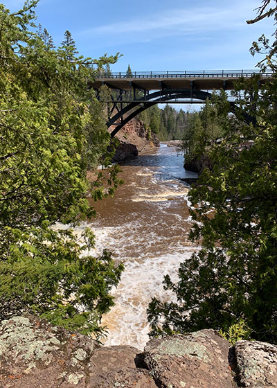 river with bridge in background