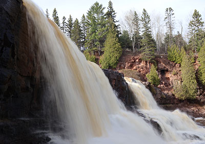 Lower waterfall with trees in background