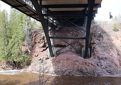 View under bridge over river