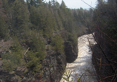 River beyond the waterfall