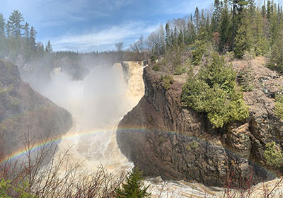 Panoramic view of river and Waterfall with ranbow