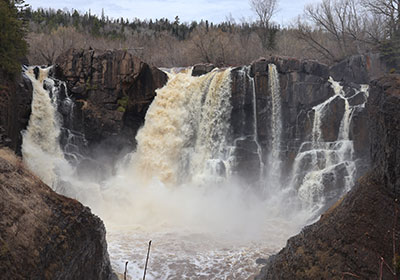 Water flows over waterfall