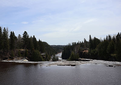 River beyond waterfall