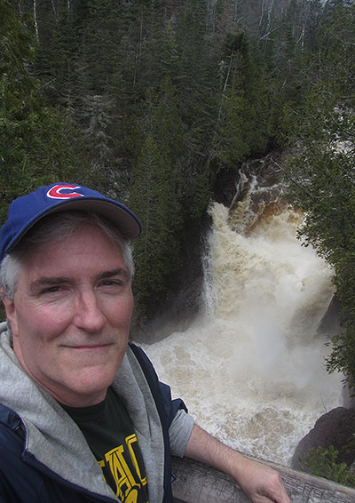 Pat with waterfall behind