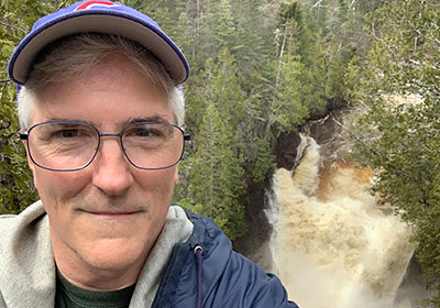 Pat selfie with waterfall