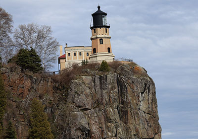 Closeup of lighthouse from beach.