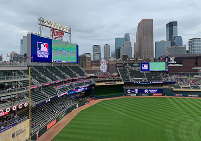 Scoreboard and seats in baseball stadium