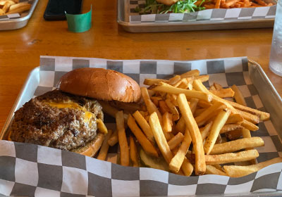 Juicy Lucy hamburger and French fries