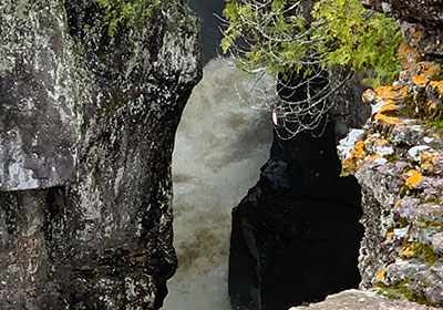 Water goes into cave