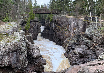 Foot bridge over river