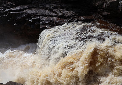 Rushing rapid of river