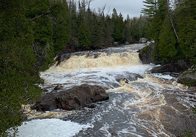 foam in the river from the rapids