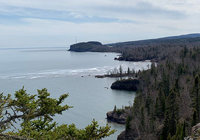 Shoreline with television antena in far distance