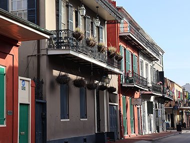 Street full of buildings with balconies
