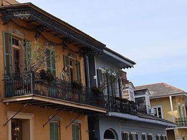 Statue on second story balcony