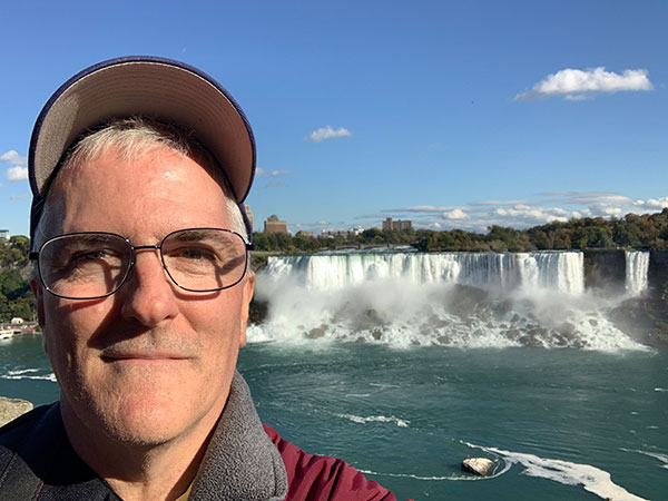 Pat in front of Niagara Falls as viewed from Canadian side