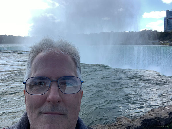 Pat with horseshoe falls in background