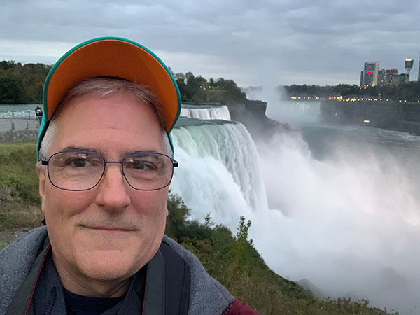 Pat with Niagara falls in background from American side